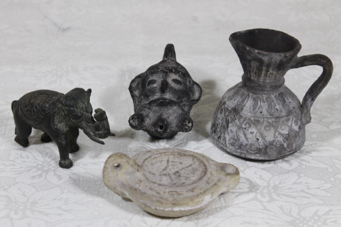 4 Artifacts (1 of 4)