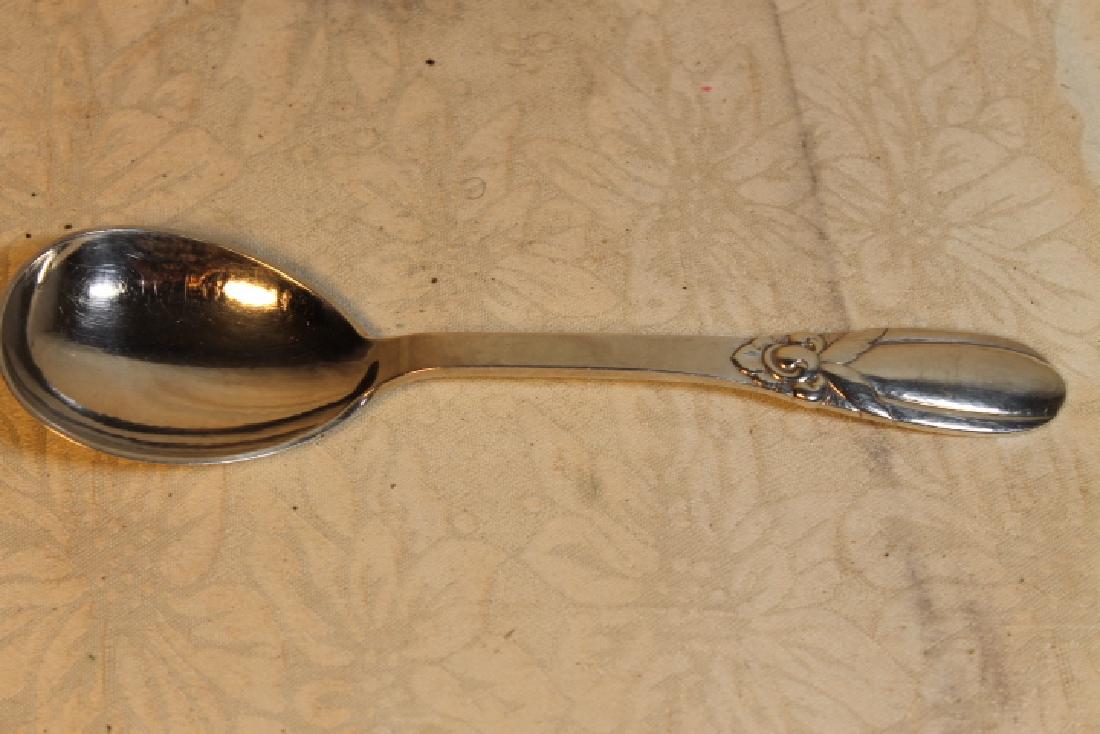 Evald Nielsen Sterling Spoon: Floral design spoon, sterling silver, by Evald Nielsen, weight is 2.095 ozt