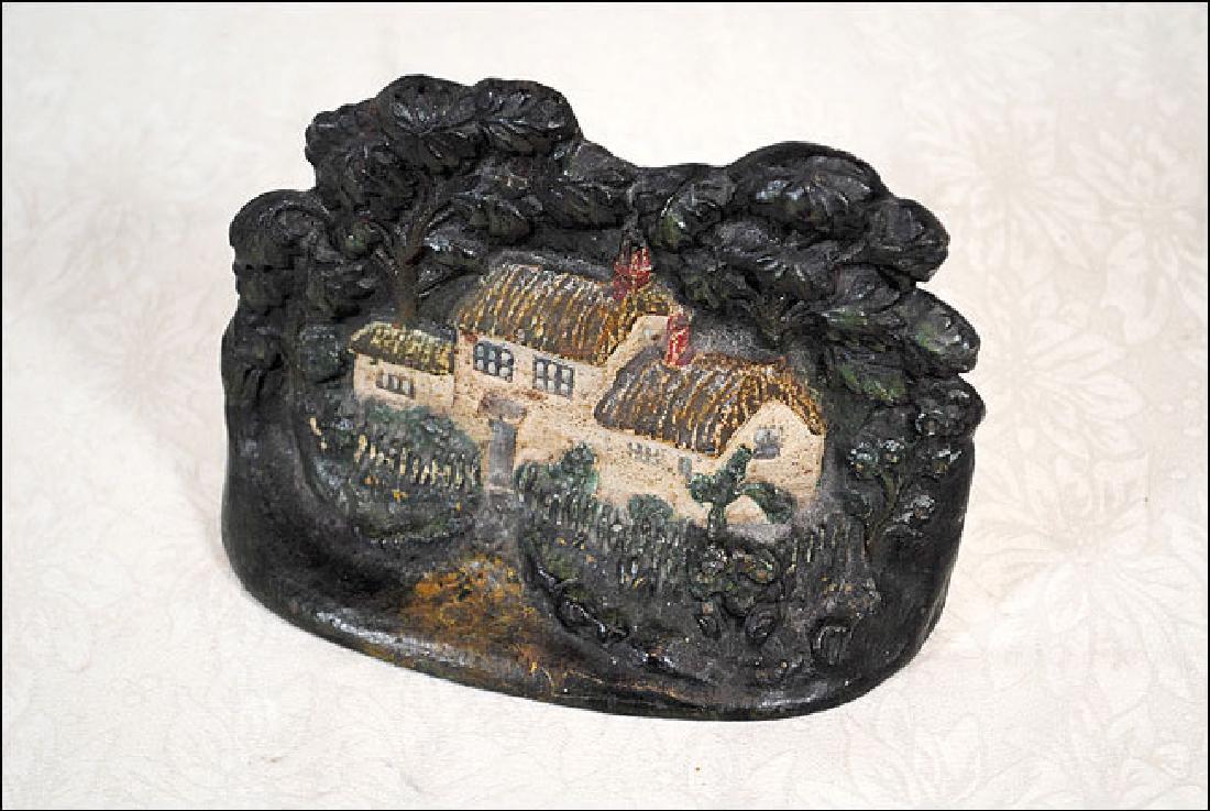 Cottage Doorstop: Doorstop, cottage with trees in background, 8" wide by 6" tall signed illegibly on reverse