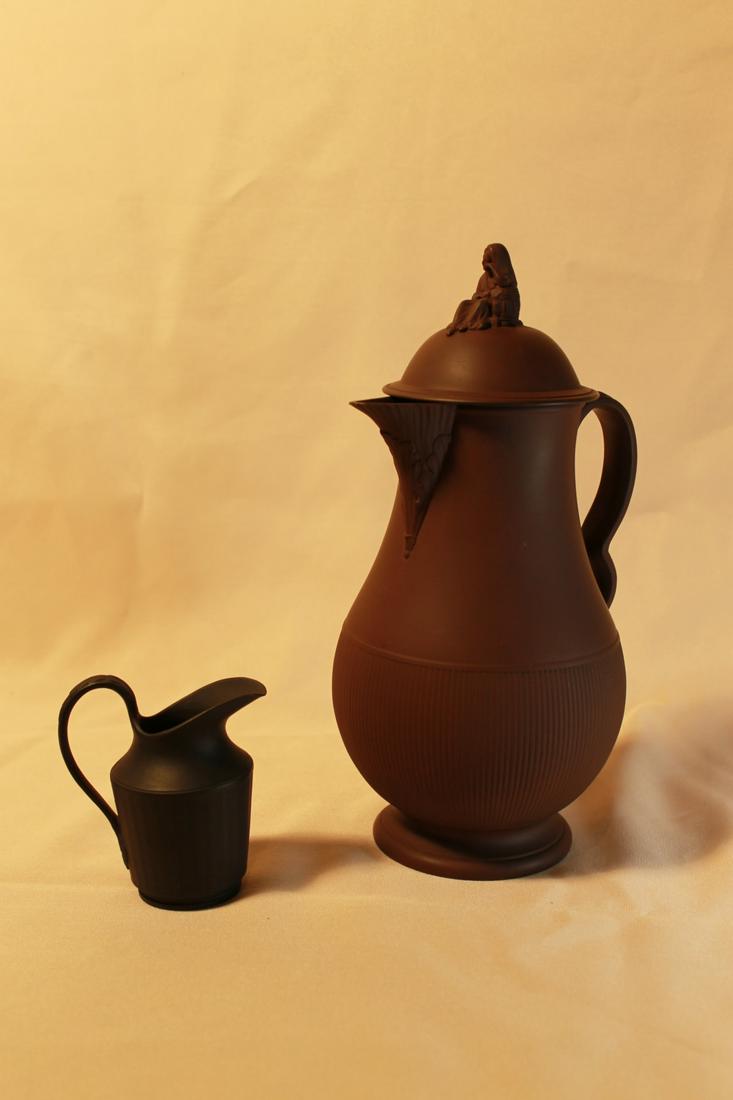 1. Tea pot, brown basalt, female figure with basket (1 of 6)