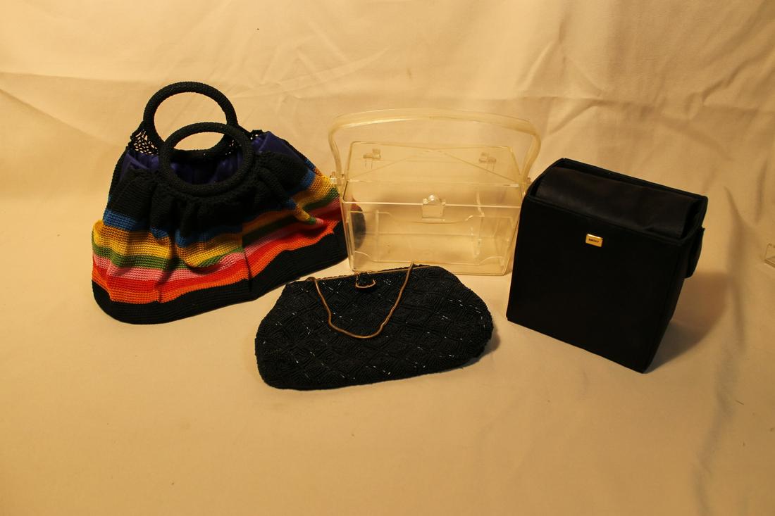 1. Henry Penssee Black Beaded2. 1960's Lucite handbag3.: 1. Henry Penssee Black Beaded2. 1960's Lucite handbag3. Double handled textile w/applied fruit4. DKNY black satin w/magnet clasp