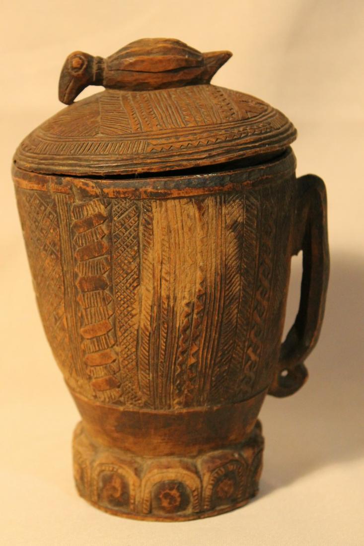Covered wooden African vessel, all over design with (1 of 4)