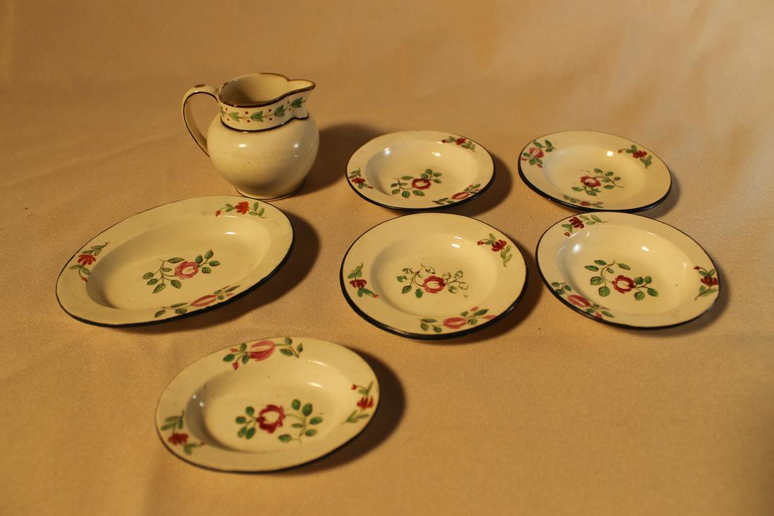 1. Four butter pads 3 1/8"2. Two tiny trays 4 3/8" x 3: 1. Four butter pads 3 1/8"2. Two tiny trays 4 3/8" x 3 1/8"3. Pitcher 2 1/4" tall