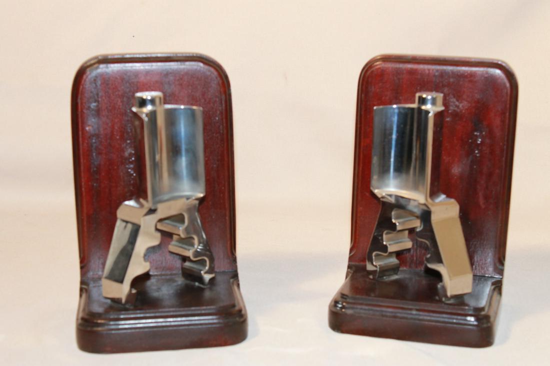 Mid Century Chrome & Wood Bookends: Industrial shaped chrome abstracts mounted on wood frames, size is 8 3/4" tall by 5 1/2" wide by 5 1/2" deep