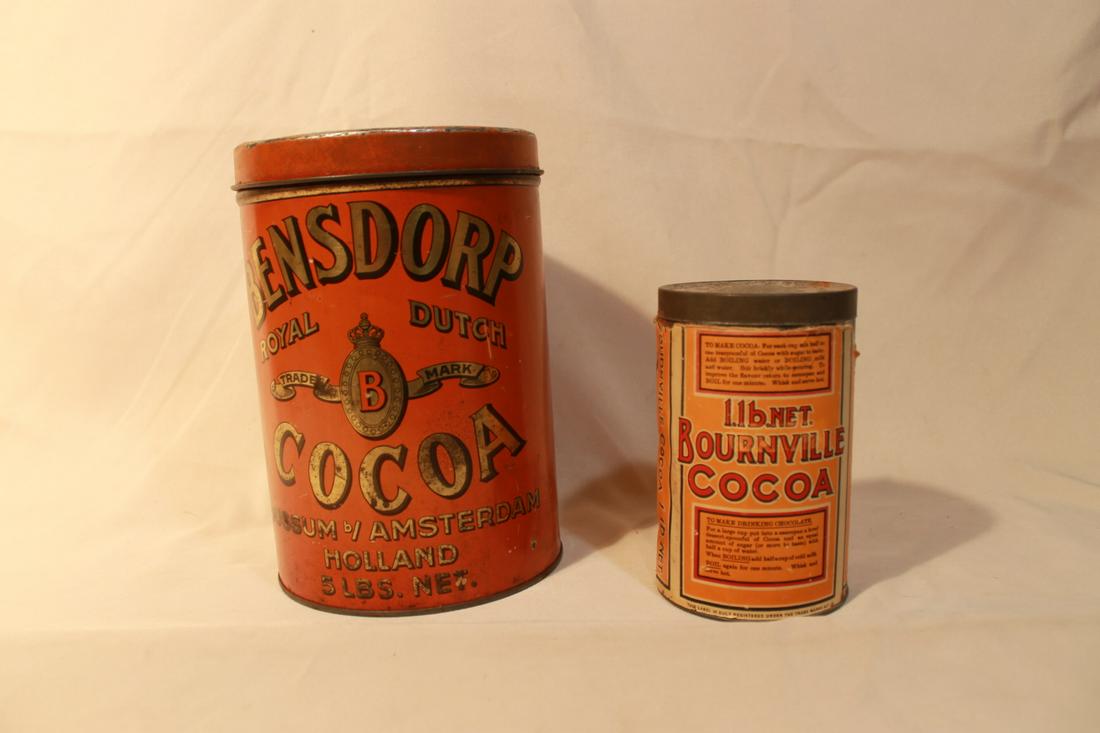 Two Vintage Cocoa Tins: 1. Bensdrop Royal Dutch, 9" tal by 6" diameter2. Rournville Cocoa Tin, 6" tall by 3 1/2" diameter