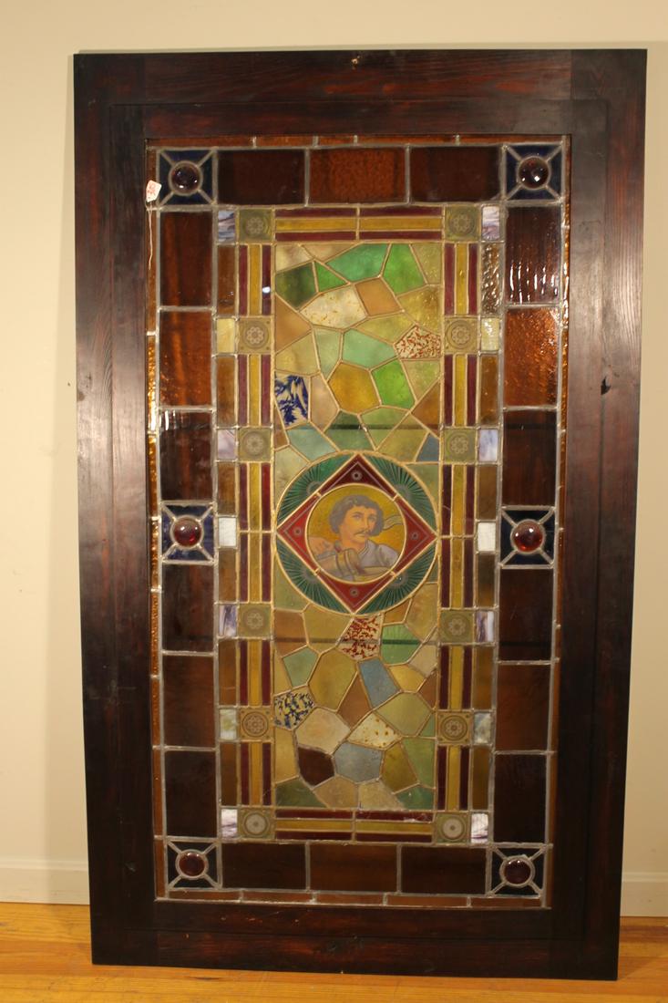 Pub Window, Leaded Glass: Pub window with leaded stained glass, center panel of a gentleman pouring wine, glass size is 50 1/2" x 27" wide, overall framed size is 61" x 36"