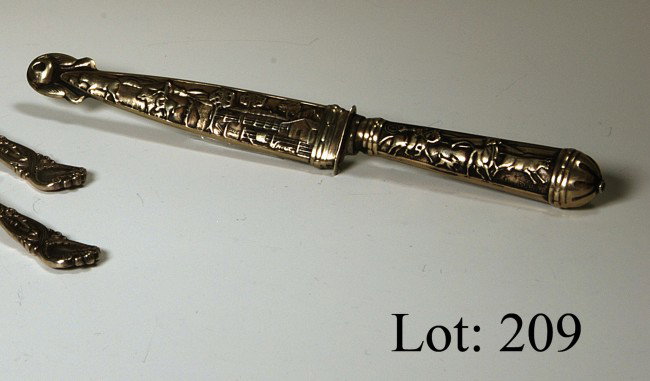 Argentinian silver wrapped knife with sheath depic: Argentinian silver wrapped knife with sheath depicting cattle farm.