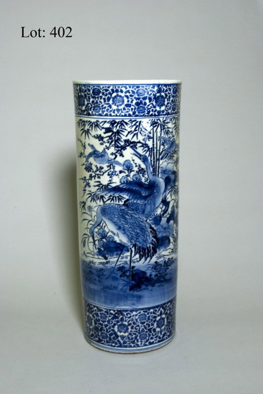 19th century round blue and white oriental porce: 19th century round blue and white oriental porcelain umbrella stand. [has damage]