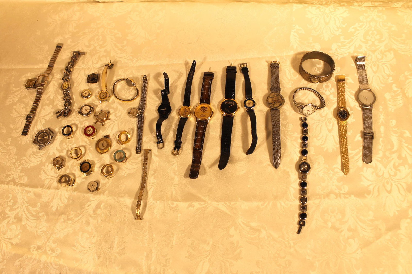 Misc. Lot of Watches & Parts: Lot of watches and watch parts and pieces, including Jaguar, Kielbert, Kodak, Rivera, Piaget, Peugot, timex and others