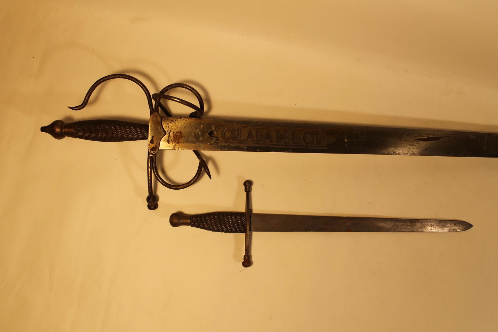 Two Pageantry Swords: 1. Spanish Colada Del Cid length 40"2. Dagger type, 17" maker unknown