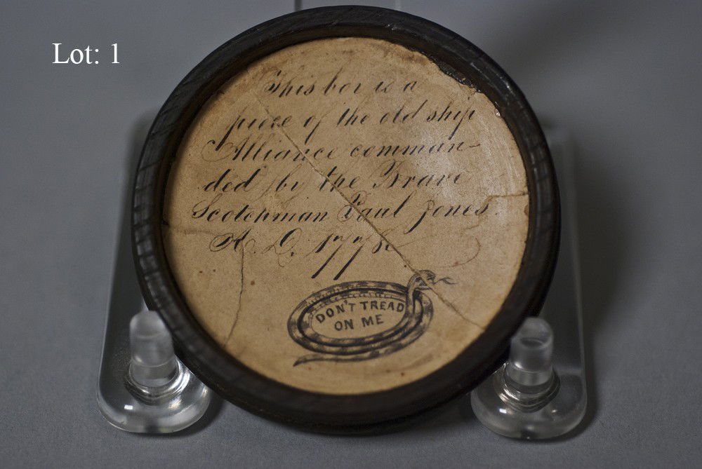 Snuff box: Reads, "This box is a piece of the old ship Alliance commanded by The Brave Scottsman Paul Jones. AD 1778." With snake motiff & "Don't Tread on Me."