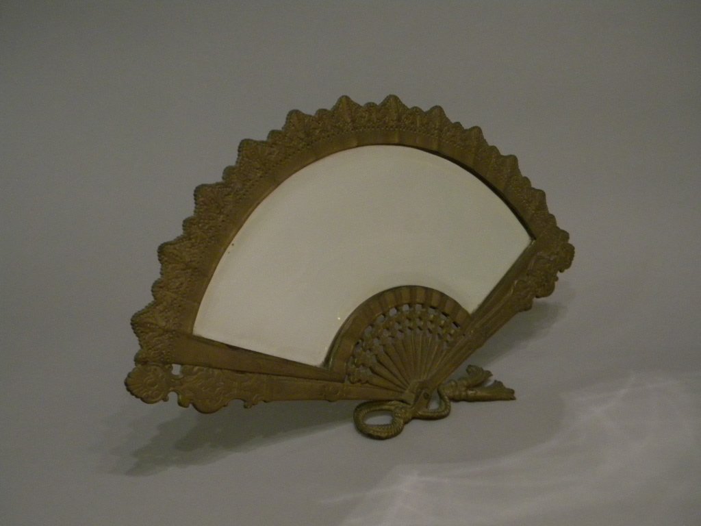 Aesthetic tabletop mirror: Bevelled glass tabletop mirror, fan shaped. Size is 18 1/2" x 11" high