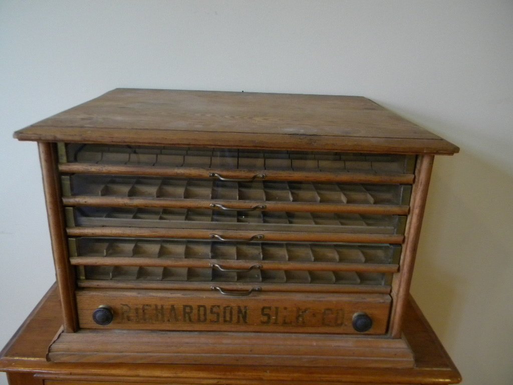 Oak Spool Chest: 6 Draw chest with 5 glass front draws and 1 wood, made for the Richardson Silk Company