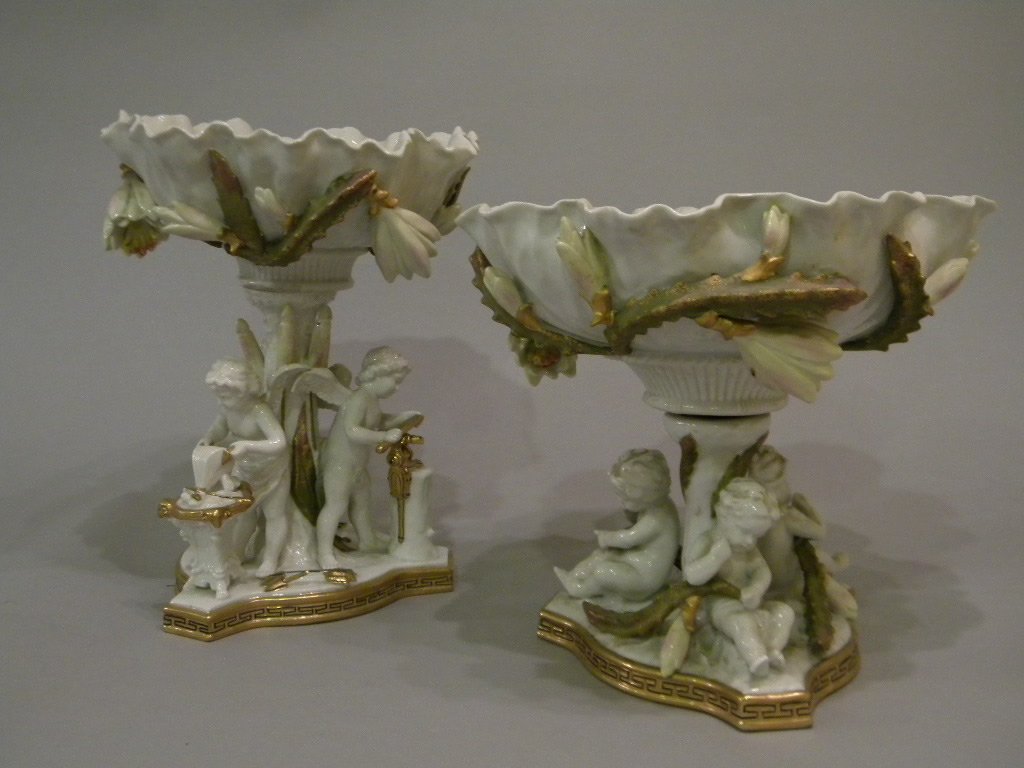 Andrea by Sadek Tall Compotes: Cactus Flowers with cupids, one 10 1/4" and the other is 12" tall