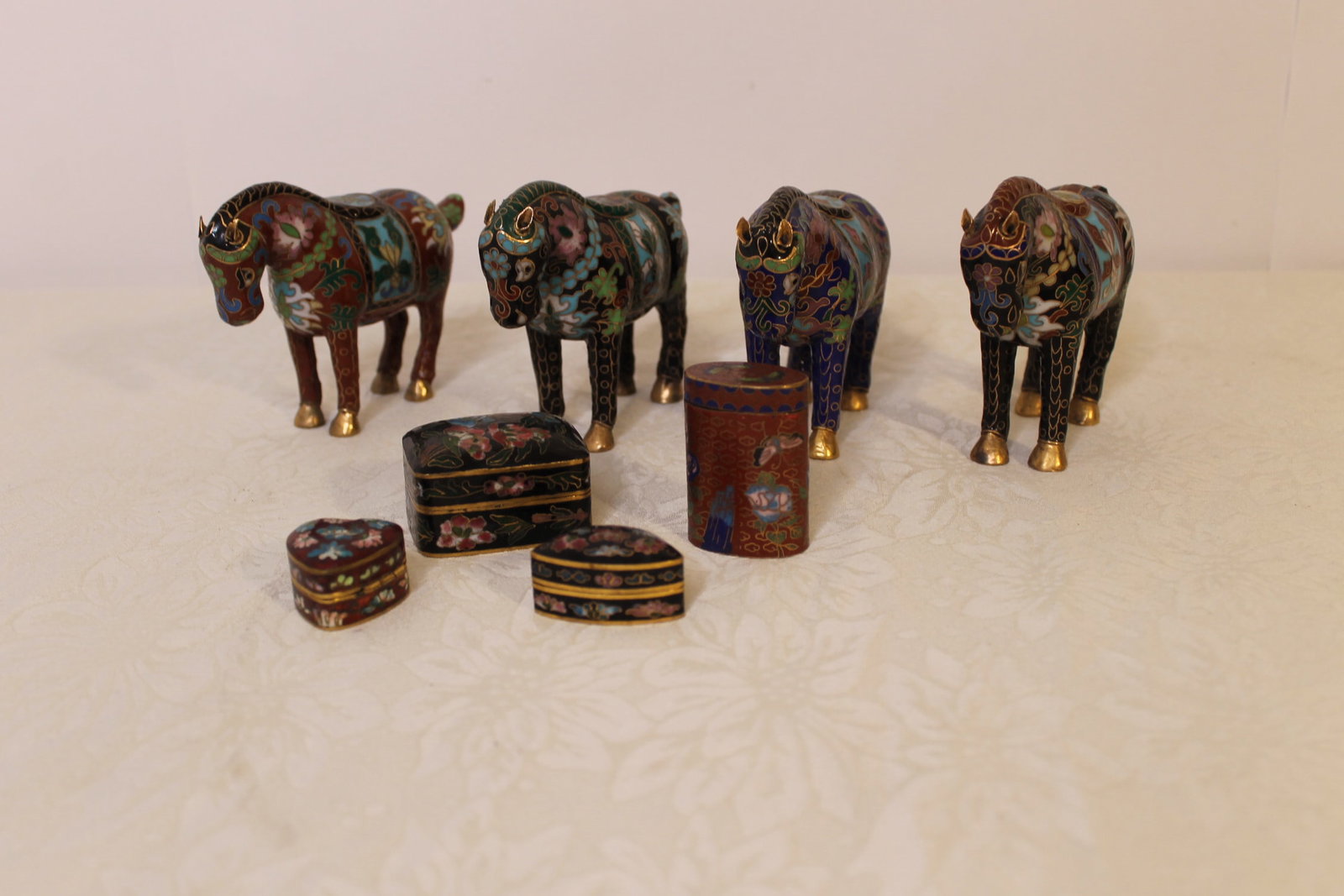 Eight Pcs of Cloisonee: Eight Pcs of Cloisonee Lot of 8 pieces of cloisonee, including 4 horses, 3 1/2" tall by 5" long, and 4 assorted small pill boxes, sizes 1 1/4" to 2"
