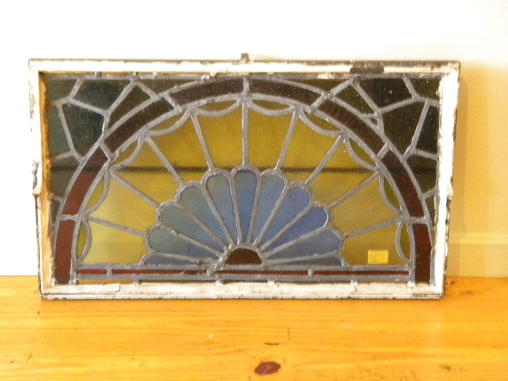 Stained Glass Transom Window: metal framed transom stained glass window, floral design size is 30 x18.