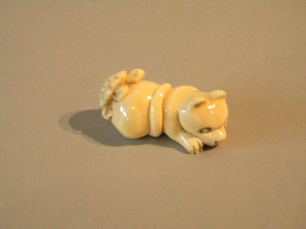 Netsuke of Cat w/Turtle: Cat with turtle netsuke size is 2" long, has signature on base