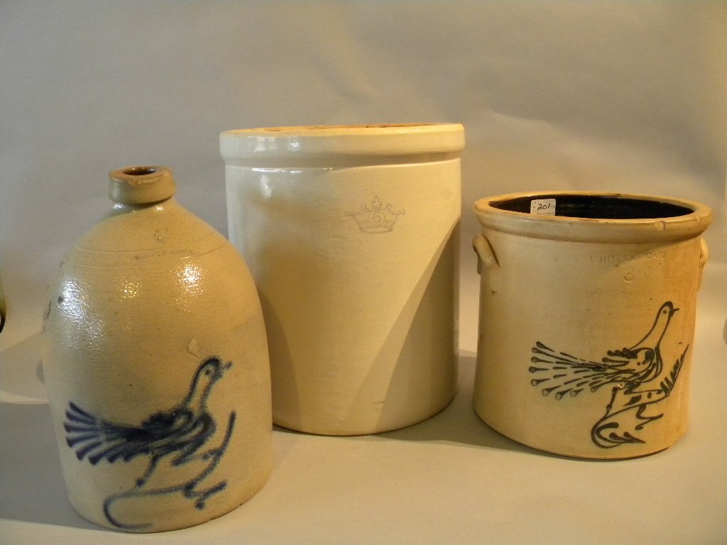 3 Stoneware Pieces: 1. White Utica NY 3 gallon crock w/cobalt bird decoration, rim and base chips, 2. 6 gallon crock w/crown mark, good condition, 3. White, Utica NY 2 gallon jug w/cobalt bird decoration, minor rim and b