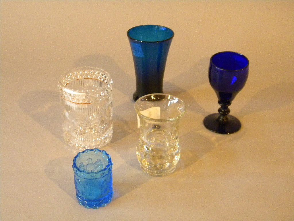5 pcs of 19th century glass: 1. Cobalt stemware piece 4 3/4" tall2. Teal 5" 3. Cut/pressed 4 1/4" glass 4. Toothpick holder with eagles 5. Coin spot vessel 4"