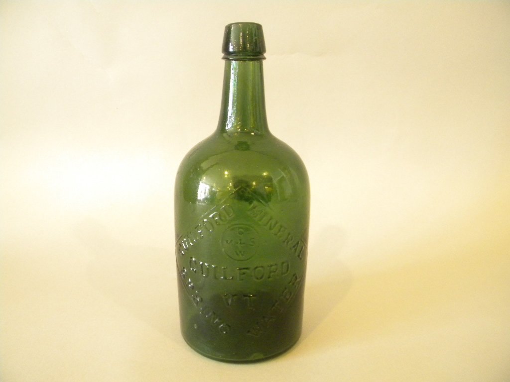 Guilford Mineral Spring Bottle: 9 1/2" tall Emerald Green Spring Water Bottle
