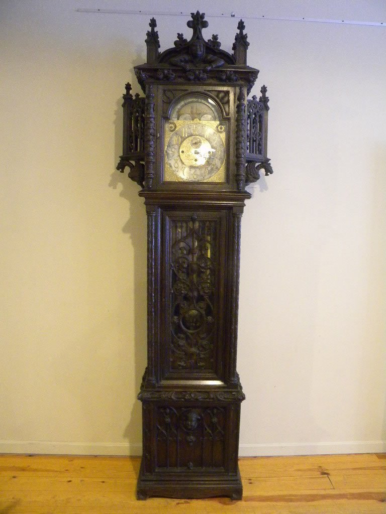 Walter Durfee 9 FT Tall Case Clock: Tiffany presentation clock by Walter Durfee. Case is Black Forest with gargoyles, Monk, Gothic Trefoils, arches and foliate carvings. 9 chime tubular with all tubes stamped Walter Durfee. Face signed 