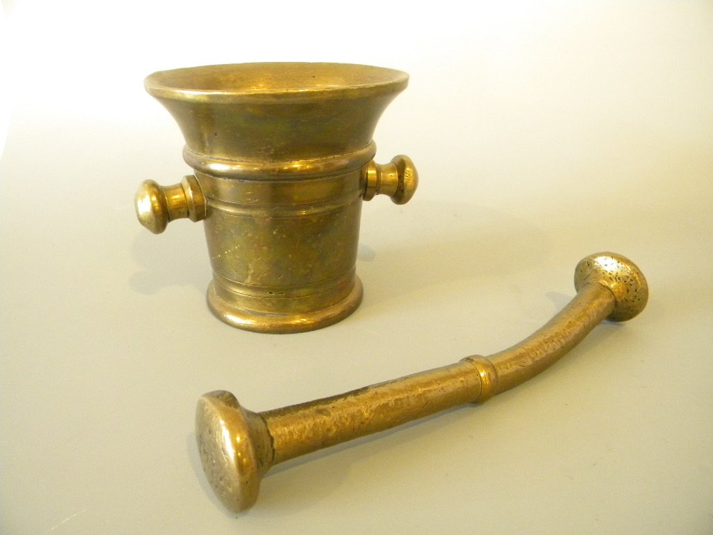 Mortar & Pestle: Solid brass mortar and pestle, size of mortar is 4 34" tall.
