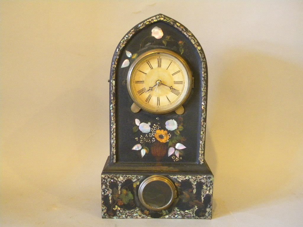Terry & Andrews Gothic Iron Clock: Shelf clock made by Terry and Andrews, Case is iron with mother of pearl inset, side button to release latch for bezel, size is 15 3/4" by 8 3/4 wide