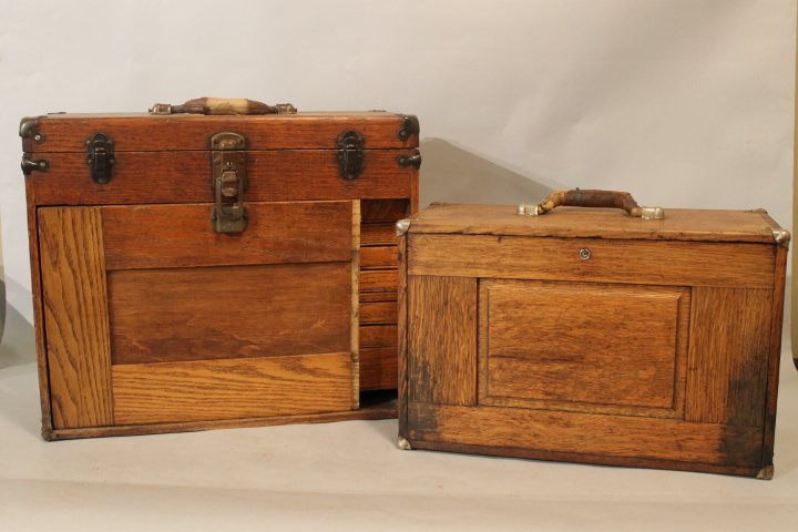 24. 2 Jewelers Cabinets, one H. Gerstner & Sons: H. Gerstner, Dayton Ohio, Jewelers cabinet with drop down door with felt, fitted inerior with several sewing implements. Size is 18 x 11 x 8. along with oak cabinet, drop down door, lift top felt inte