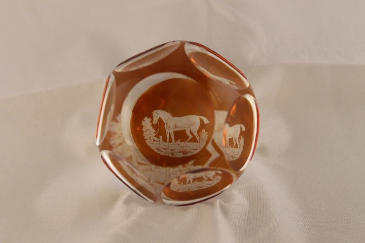 Baccarat, Antique Paperweight: Antique Baccarat paperweight. Cane 2, flash. Faceted flash weight, engraved on yellow bottom with a tethered horse. 1 top and 6 side facets. Size is 2 1/2" wide by 1 3/4" tall, has box