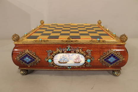 Austro-Hungarian 20th Century Chess Set: 20th century signed and marked 925. Austro-Hungarian chess set, wood box with porcelain painted plaques, aprox 12 x 12" square, gold and silver gilt with enamel pieces.