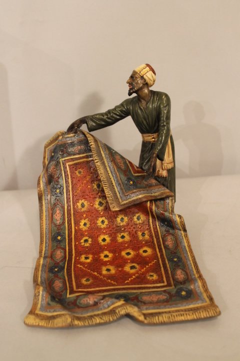 Franz Bergman Austrian Bronze, 20th century: Rug merchant, 6 3/4" tall by 7"long, by 6" deep. Cold painted bronze, 20th century, has B within vasiform mark