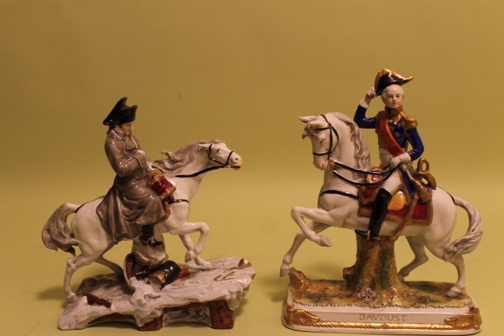 Porcelain Statues of Napoleon & Devoust: 1. Napoleon 10" x 9" on horseback, porcelain statue, no mark, [horn has chip] 2. Devoust 11 1/4" x 8 1/2" on horseback, porcelain statue, mark on base, cross swords with S for Scheibe Alsbach
