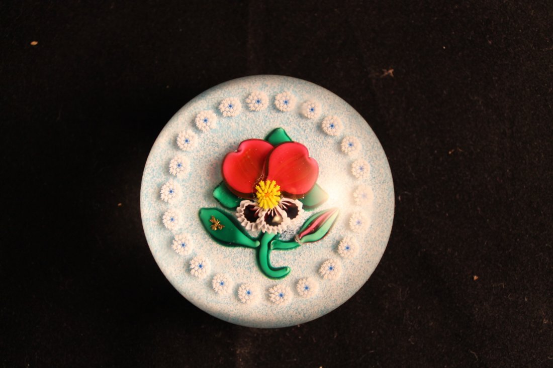 Charles Kaziun Jr Paperweight: Paperweight with gold bee and gold k for Charles Kaziun Jr, deep red and blue pansy stem and leaves, bud on light blue jasper ground, garland of white canes, size is 2 1/2"