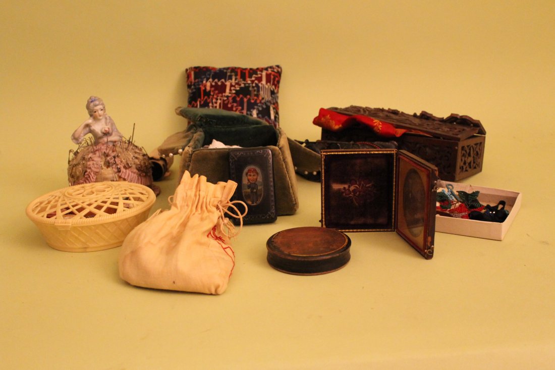 Sewing Lot: Misc lot of buttons, needles, tap measure, pin cushion doll, pin cushion chair, celluloid basket, and other odd items