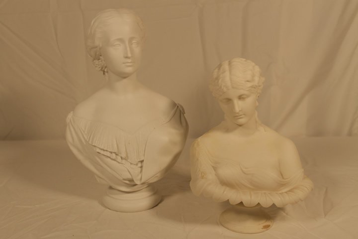 Two Parian Busts: 1. 12" parian bust, signed with blue wafer on base and initialed GJ. Back of base is stamped Gille 1st Feb. 2. 9 1/2" parian bust stamped on reverse #143.