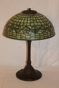 Tiffany Studios, New York Lamp: Tiffany Studios leaded glass "Acorn" pattern shade with a "Lumis" bronze base, #333. Shade is green slag glass 14" diameter, marked shade & base, Tiffany Studios, New York. 3 sockets, original patina