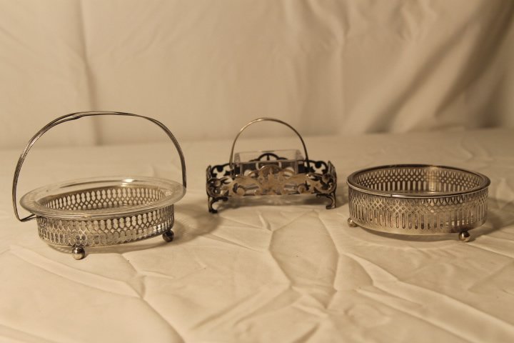 Three Crystal Baskets in Silver Frame: Lot of 3 crystal baskets in sterling frames. Sterling weight is 4.31 ozt, diameters to 5"