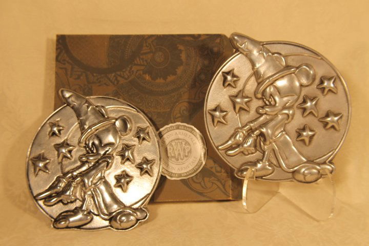 Pair of Wilton Trivets: Lot of two trivets, Mickey Mouse Sorcerer's, size is 7" diameter, one in original box