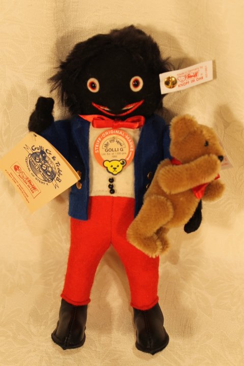 Golligog & Teddy B. Steiff: Golligog & Teddy B. Steiff. Steiff Golligog & Teddy bear dolls. White tags in ears. 9.50" tall paper tags