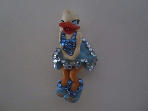 Brooch Pin of Daisy Duck a la Marilyn Monroe: Brooch Pin of Daisy Duck a la Marilyn Monroe. Designed by Wendy Gell for Disney. Flirtacious Daisy Duck in blue sequined dress and blue sequined open toed shoes. 1980's. 2.5"l x 1.25"w