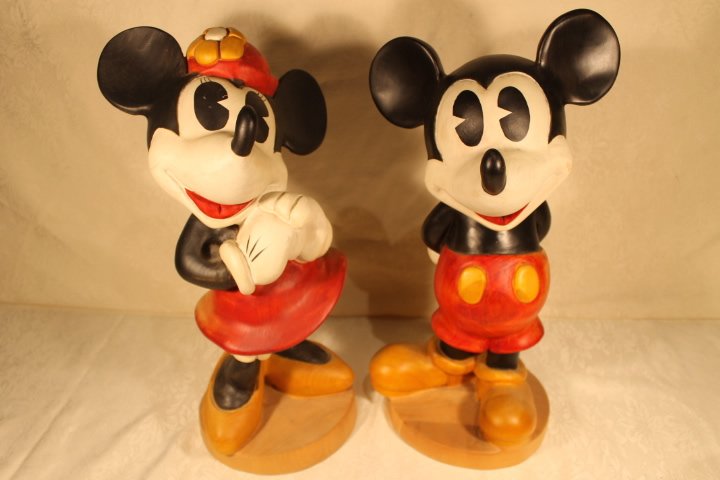 2 Walt Disney Production Sculptures: Wood sculptures, Mickey and Minnie, 18 1/2" tall, Walt Diney Productions