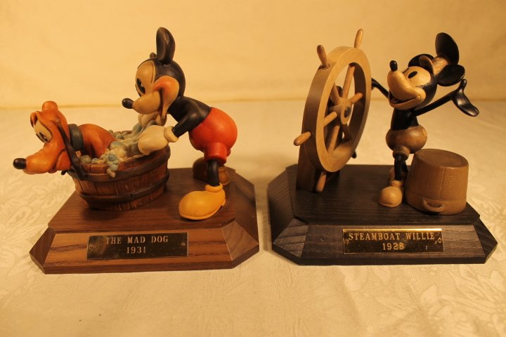 2 Anri Wood Sculptures one signed: 1. Mad Dog, 1931 Ulrich Bernardi signed, #677/1000, size is 6" tall 2. Steamboat Willie, 1928 #736/1000 size is 6" tall unsigned