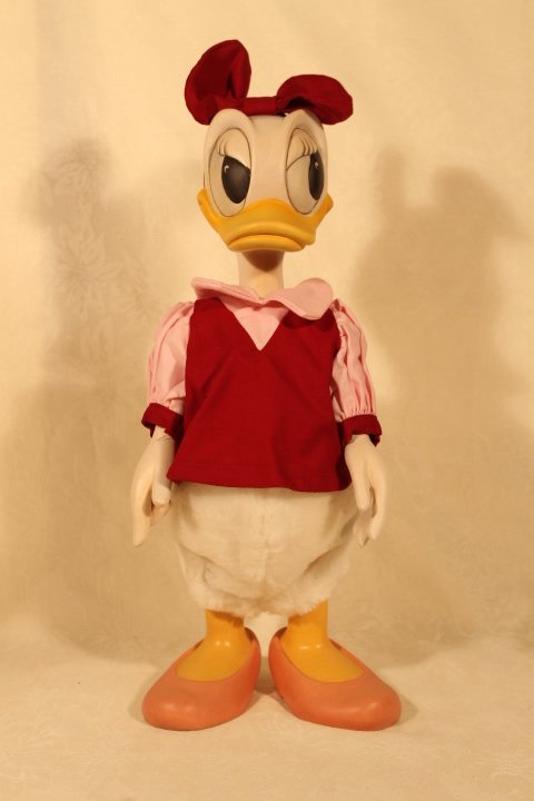 ANRI Woodcarving of Daisy Duck: ANRI woodcarving of Daisy Duck, autographed by Ulrich Bernardi size is 15" tall, unused in original box