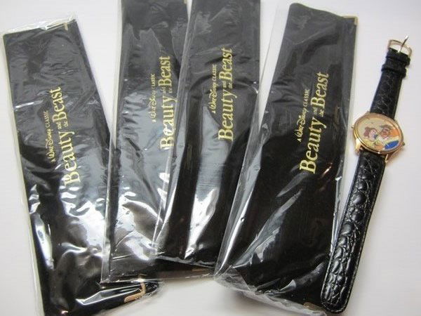 Lot of 5 Disney Beauty & The Beast Melody Watches: Lot of 5 Disney Beauty & The Beast Musical Melody Watches. LE collector watches. Face depicts Disney's classic Beauty and the Beast, black leather band, gold tone bezel, ss caseback, shock resistant.