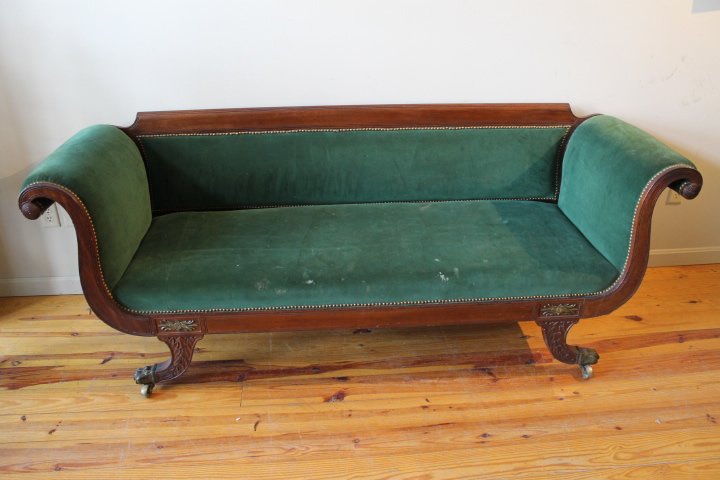 Duncan Phyfe Sofa, Rolled Arms: Period sofa with rolled arms, wood back rail, carved front legs on brass paw castors, size is 33" tall x 26" deep x 86 1/2" long
