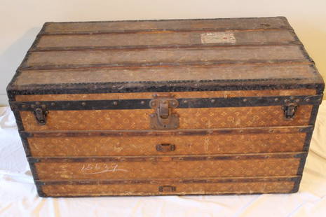 Louis Vuitton Steamer Trunk: Origina Louis Vuitton stemer trunk, Has quilted and canvas interior with fitted shelves paper label, #112354, monogrammed HP on both sides, for harold pearce, size is 43 1/2" long by 22 1/4" wide by 2