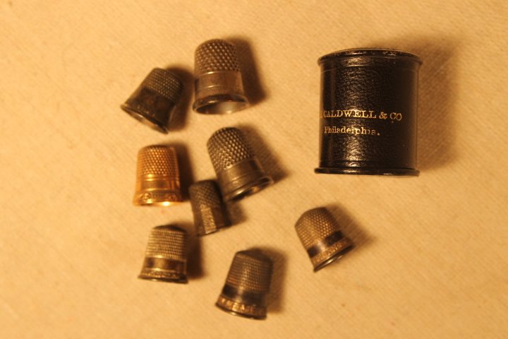9 Thimbles, 2 Gold, 7 Silver (1 of 2)