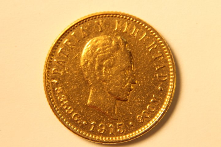 5 Peso Cuban Gold Coin: 5 peso Cuban gold coin, front is Jose Marti, and back is coat of arms, fitted in a Stowell Jewelers, Boston, box