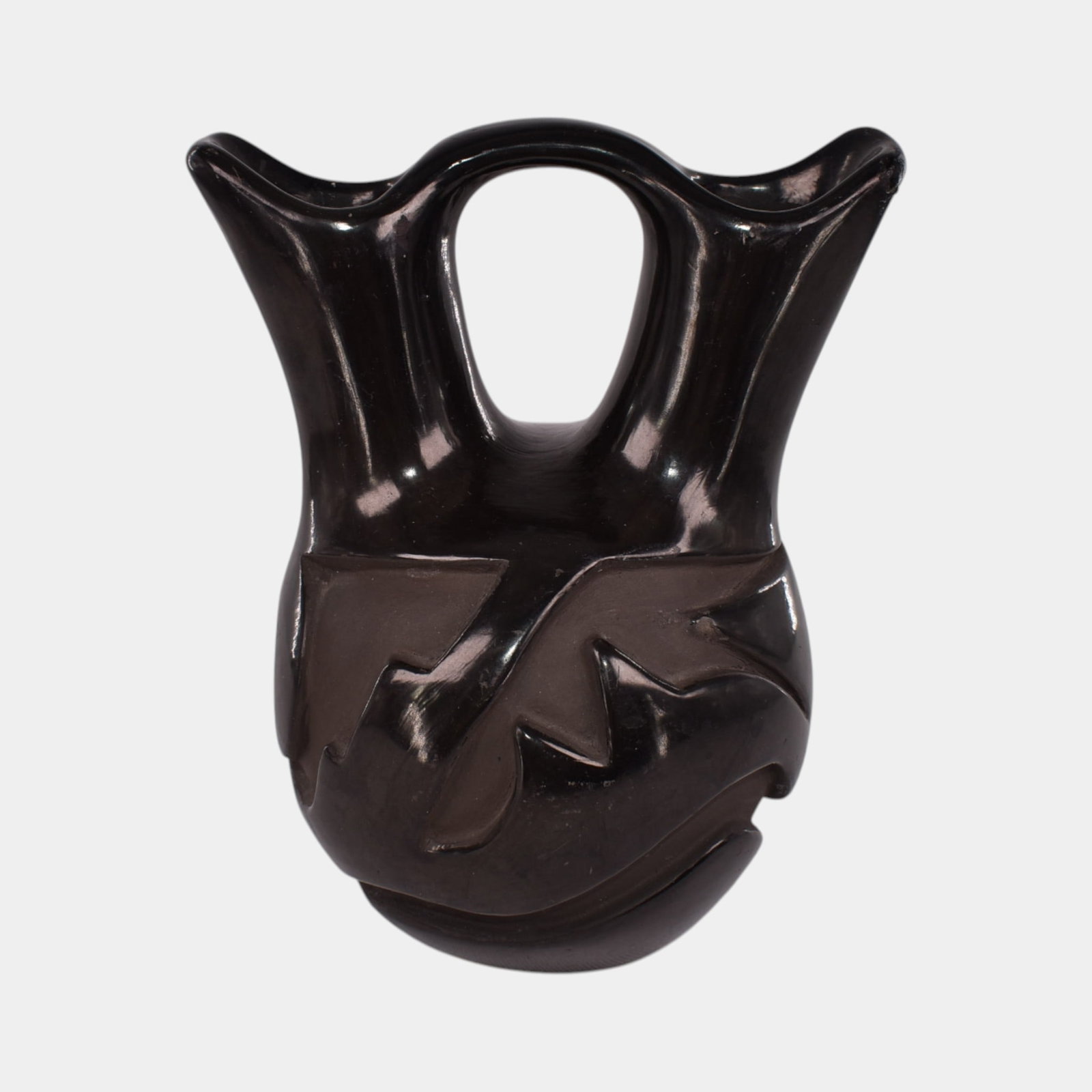 Santa Clara Blackware Pottery Avanyu Rain Serpent Wedding Vessel: We offer in house shipping on all items. Plus spend $2000 on winning bids and your shipping is free. Santa Clara Blackware Pottery Avanyu Rain Serpent Wedding Vessel Shows well with repair to one rim 