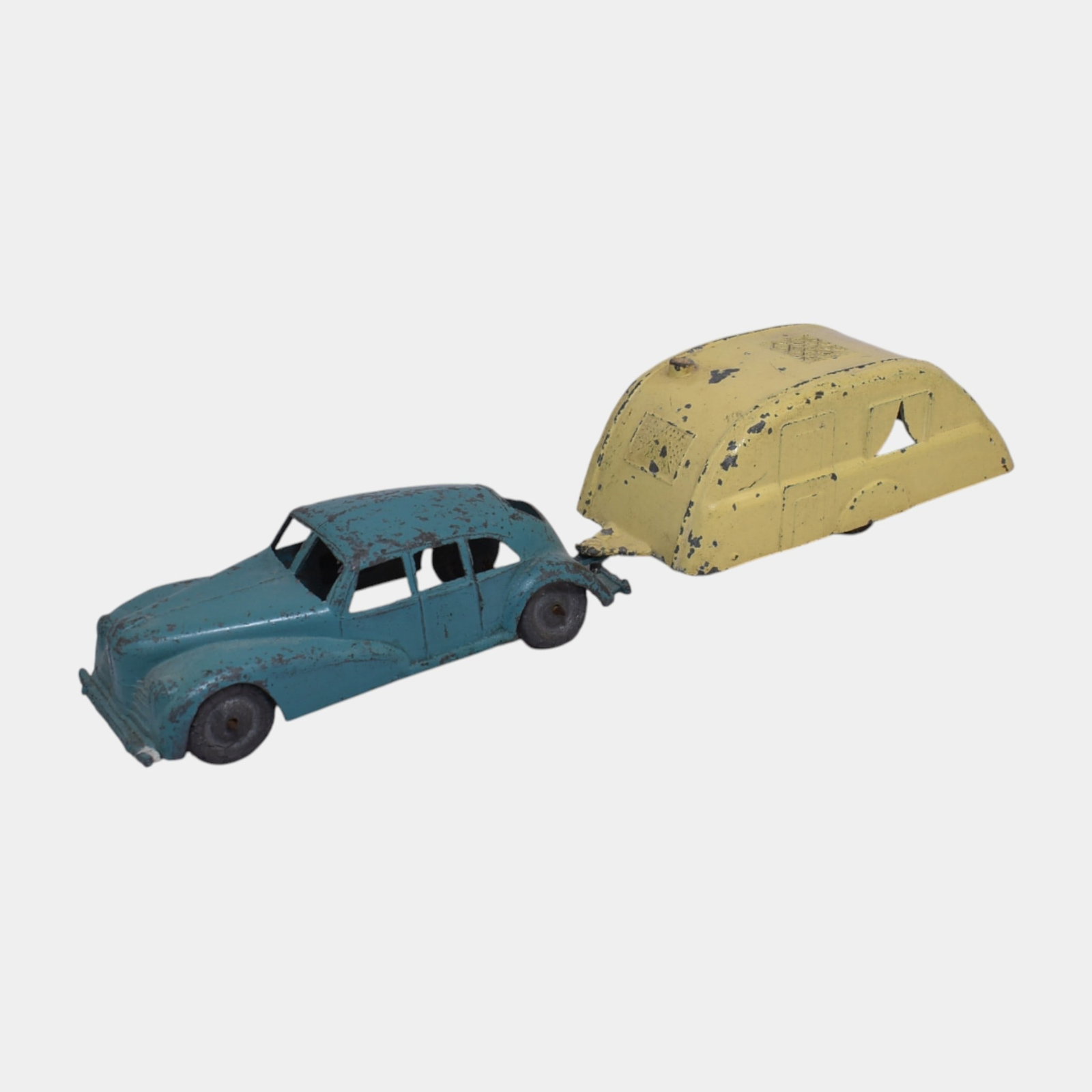 Kemlow England Presses Steel Chevy Fleetmaster Blue Saloon and Cream Camper: Kemlow England Presses Steel Chevy Fleetmaster Blue Saloon and Cream Camper Charming Kemlow die-cast car and yellow caravan trailer with classic British styling and vintage patina. A nostalgic mid-cen